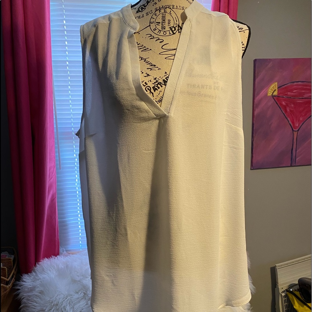 Sleeveless white womans blouse